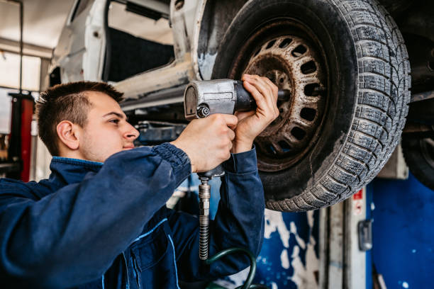 istock Mechanic changes a tire in a repair shop 1314047134