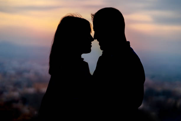 istock backlighting of a couple in love creating a silhouette 1314049591