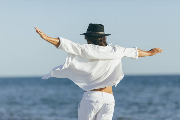 istock Man Beach Summer Holiday Vacation Concept 1314050789