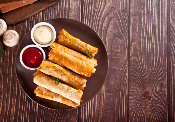 istock Sigara burek turkish crispy fried pastry rolls filo phyllo dough 1314052962