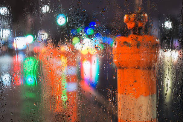 istock Rainy weather and raindrops on the glass. 1314058236