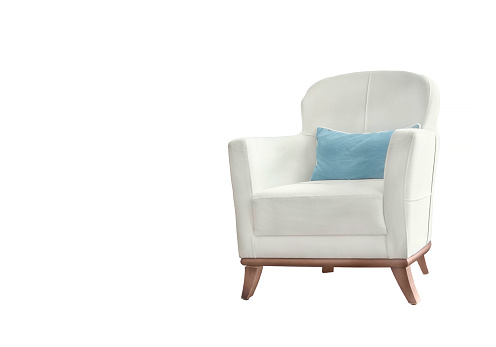 white armchair with turquoise cushion on white background