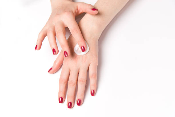 istock Woman applying cream on hand 1314059116