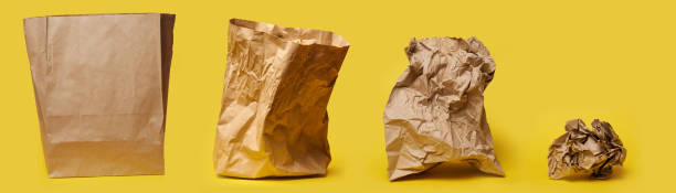 stages of crumpled paper bag, garbage recycling - paper bag bag packed lunch paper imagens e fotografias de stock