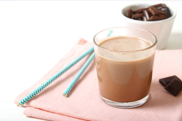 istock chocolate milk in a glass on the table. 1314060822