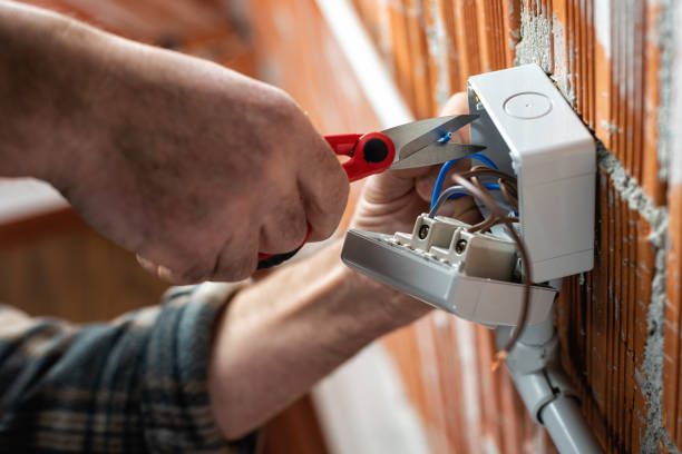 istock Electrician at work on a residential electrical system. Electricity. 1314065479