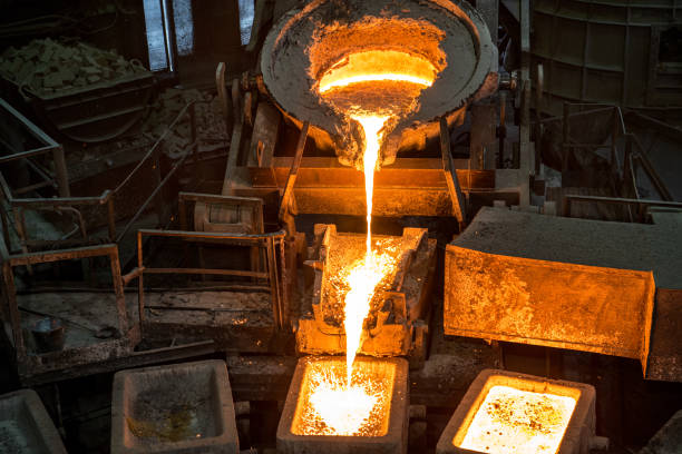 istock Tank pours liquid metal in the molds by carousel machine 1314070769