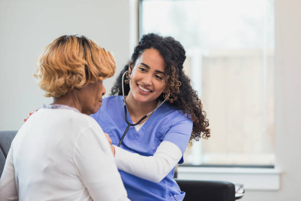 istock Nurse uses stethoscope to check patient's heart and lungs 1314076043