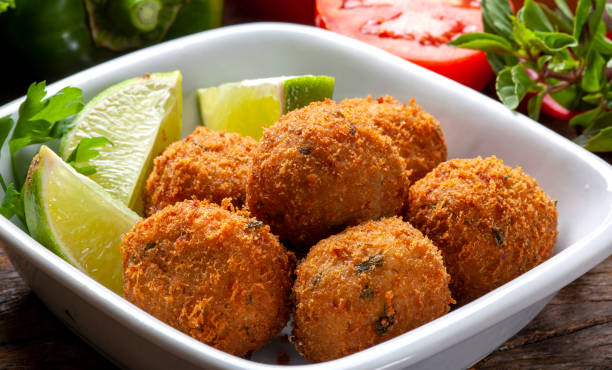 istock cod dumpling, salt cod fritters, bunuelos de bacalao. Brazilian snack 