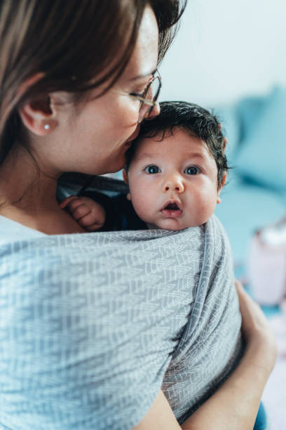istock Baby is always close to mom 1314078041