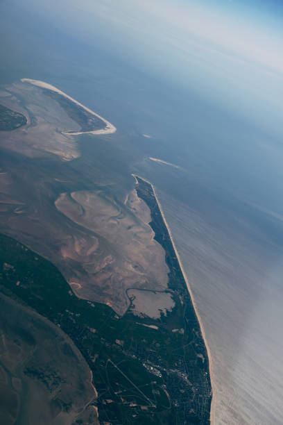 istock View from the airplane window to the ground and the forest below 1314080767