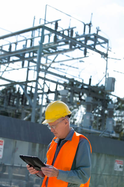 istock Senior Engineer looking and checking electric power station. 1314084881