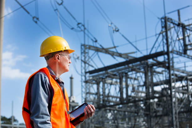 istock Senior Engineer looking and checking electric power station. 1314085004