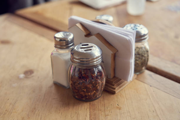 Table napkin and table salt shaker in a restaurant in a town in Colombia