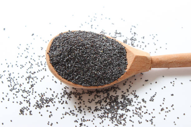 istock poppy seeds isolated on white 1314087989