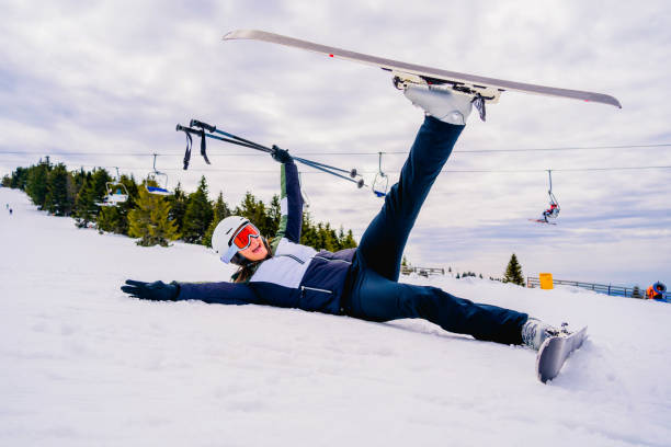 istock Skier woman lying in the snow 1314089518