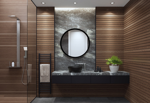 Luxurious bathroom with natural stone tiles and wood planks.
