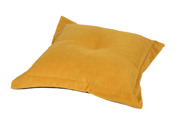 istock yellow sofa cushion. isolated on white, copy space. 1314092871