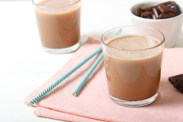 istock chocolate milk in a glass on the table. 1314097313