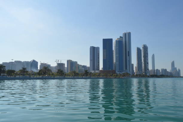 istock Abu Dhabi city skyline along Corniche beach taken from a boat 1314098026