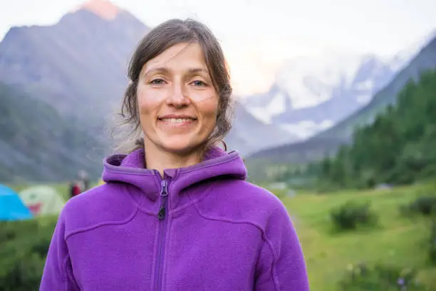 Young woman camping in mountains of  Belukha,Altai