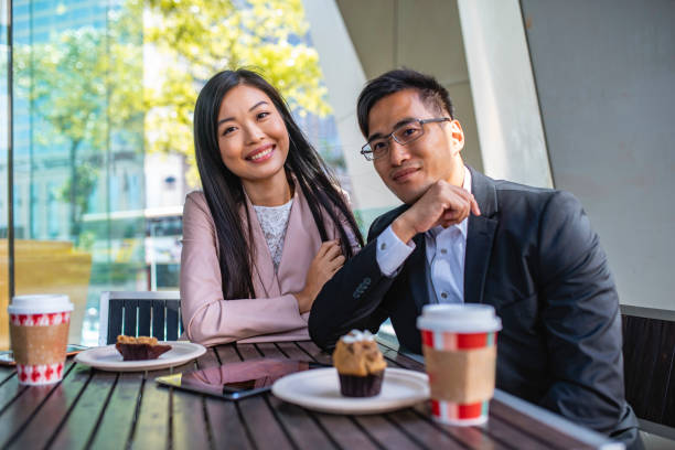 istock Relaxed Chinese Business Partners Enjoying Coffee Break 1314100282