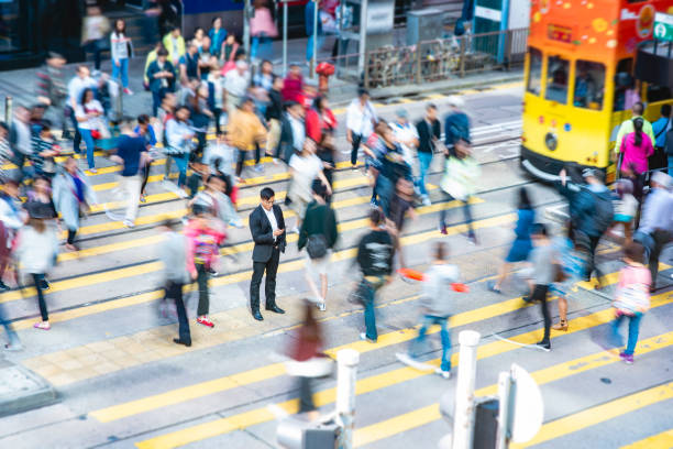 istock Mature Chinese Office Worker Standing Out From the Crowd 1314100296