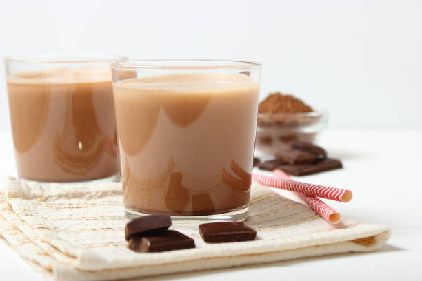 istock chocolate milk in a glass on the table. 1314101774