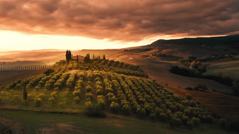 AERIAL Two drone shots at the Tuscany region at sunset