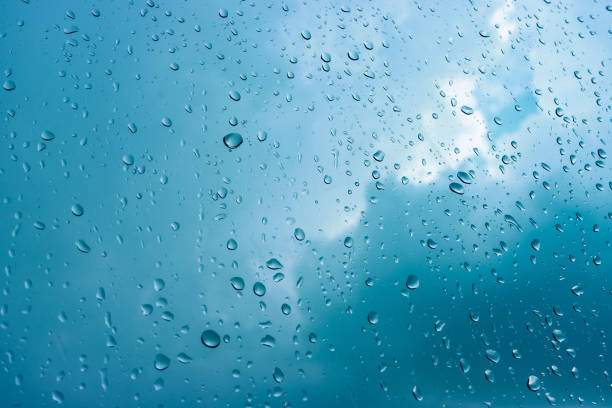 istock Rain drops on window glasses in rainy day with selective focusing 1314108766