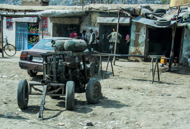 Old armoured vehicles military escorts, guns and tanks in Gardez in Afghanistan