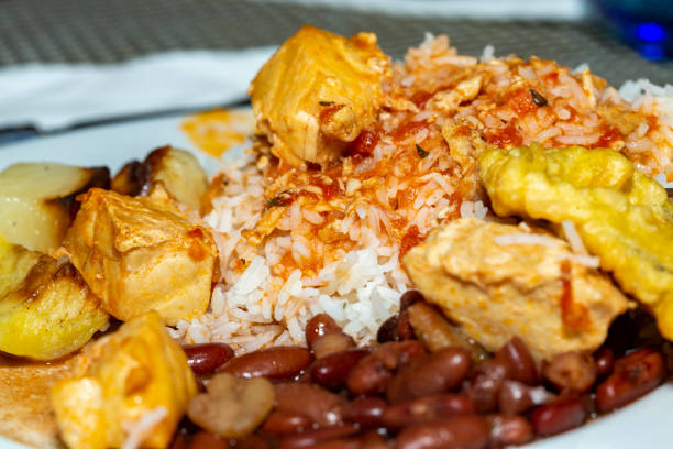 istock boiled rice with red kidney beans, tofu, fried fish and chicken 1314118909