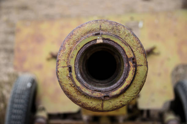 Close-Up Of A Rusted Industrial Metal Shaft And Flange On Abandoned Machinery, Showing Corrosion, Wear, And Aging Equipment In An Outdoor Industrial Environment.