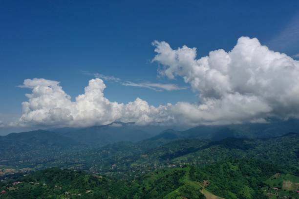 istock view of mountains, forest and village from drone 1314121429