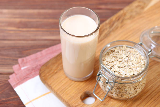 istock oatmeal milk on the table. Vegetable Milk, Vegetarian Milk. 1314123690