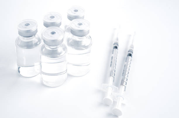 istock Empty bottle of vaccine with syringe for hygiene injection. 1314124989