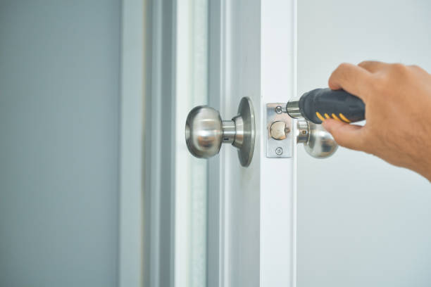 istock locksmith home service with silver handle and screwsriver on white door in house 1314127173