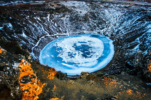 Icy volcano lake in iceland at sunrise