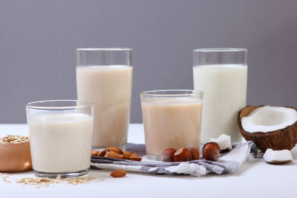 istock Different types of vegetable milk on the table. 1314129265