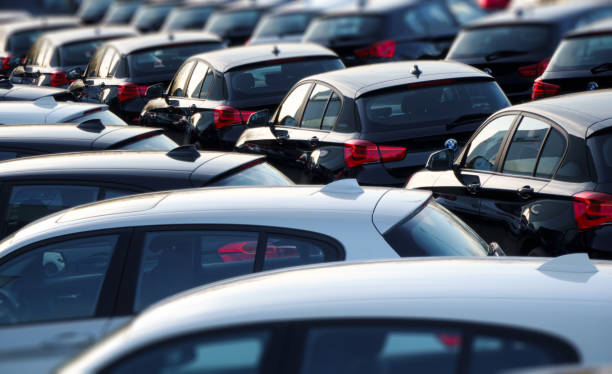 Used BMW vehicles - parked at a public car dealership in Hamburg Hamburg, Germany - April 23. 2021: A row of used BMW cars parked at a public car dealership in Hamburg, Germany. No people in this picture bmw dealership stock pictures, royalty-free photos & images