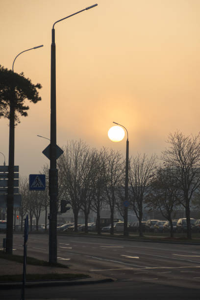 istock Dawn on a city street in the fall. 1314134456