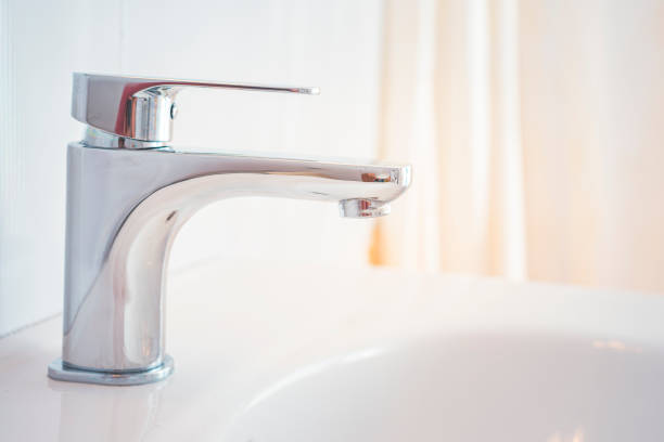 istock Hygiene concept. Water flowing from faucet. 1314135895
