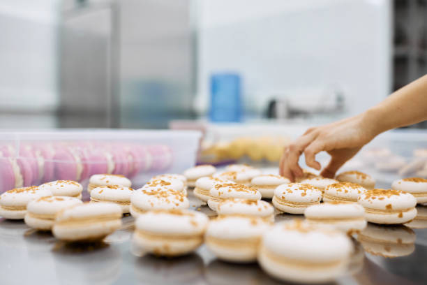 istock A bright girl holds fresh cakes and macaroons in her hands 1314137926