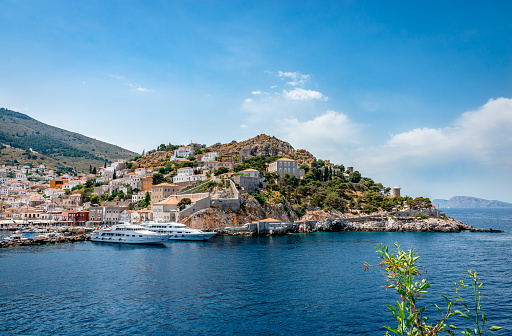 View of the entrance of the port of the island, seen from Miaoulis' monument. Hydra is a small picturesque island in Saronic gulf and a popular tourist destination.