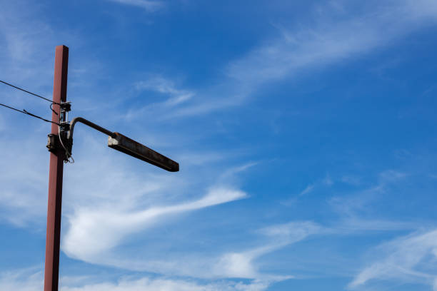 istock Light pole in the middle of the sky. Copy space. 1314139502