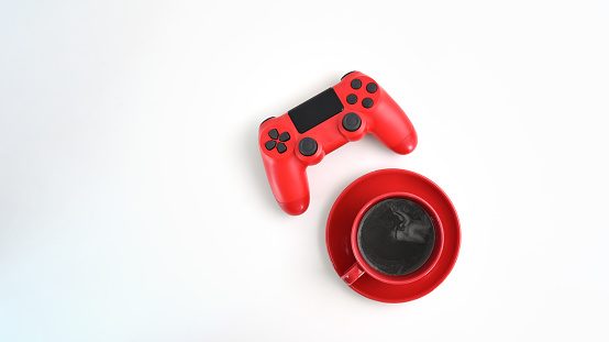 Mock up red coffee cup and joystick on white background.