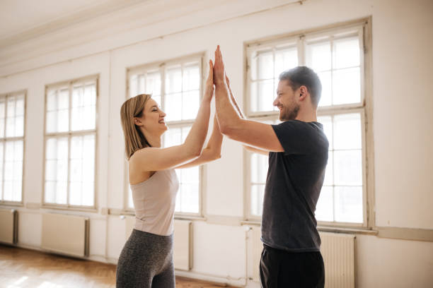 istock Friendly young couple giving high five after working out 1314141926