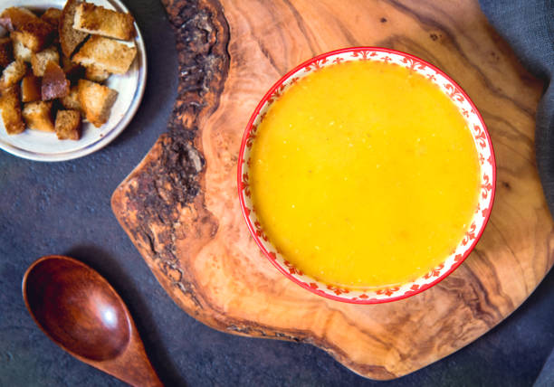 istock Vegetable puree soup and croutons on table 1314142755