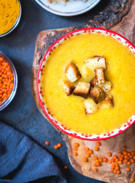 lentil puree soup with homemade crunches. healthy eating - cooked vertical high angle view lentil imagens e fotografias de stock