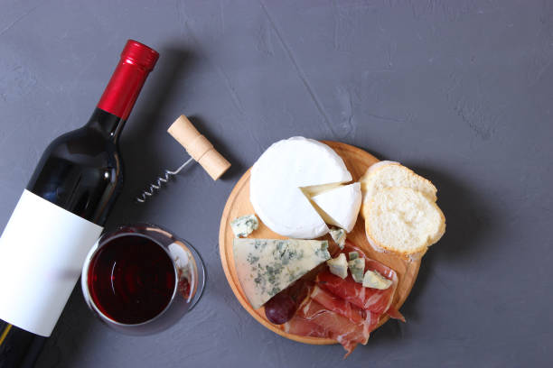 istock red wine and snacks on the table top view. 1314144754